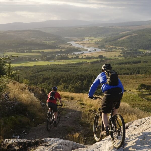 A COUPLE OF MOUNTAIN BIKERS ON THE BLACK ROUTE - PART OF THE BALBLAIR MOUNTAIN BIKE TRAILS (FORESTRY COMMISSION) NEAR BONAR BRIDGE, SUTHERLAND, SEPTEMBER 2008