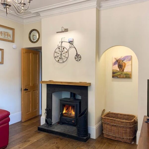 Fireplace with wood stove, Sluice Keeper's Cottage, Dornoch