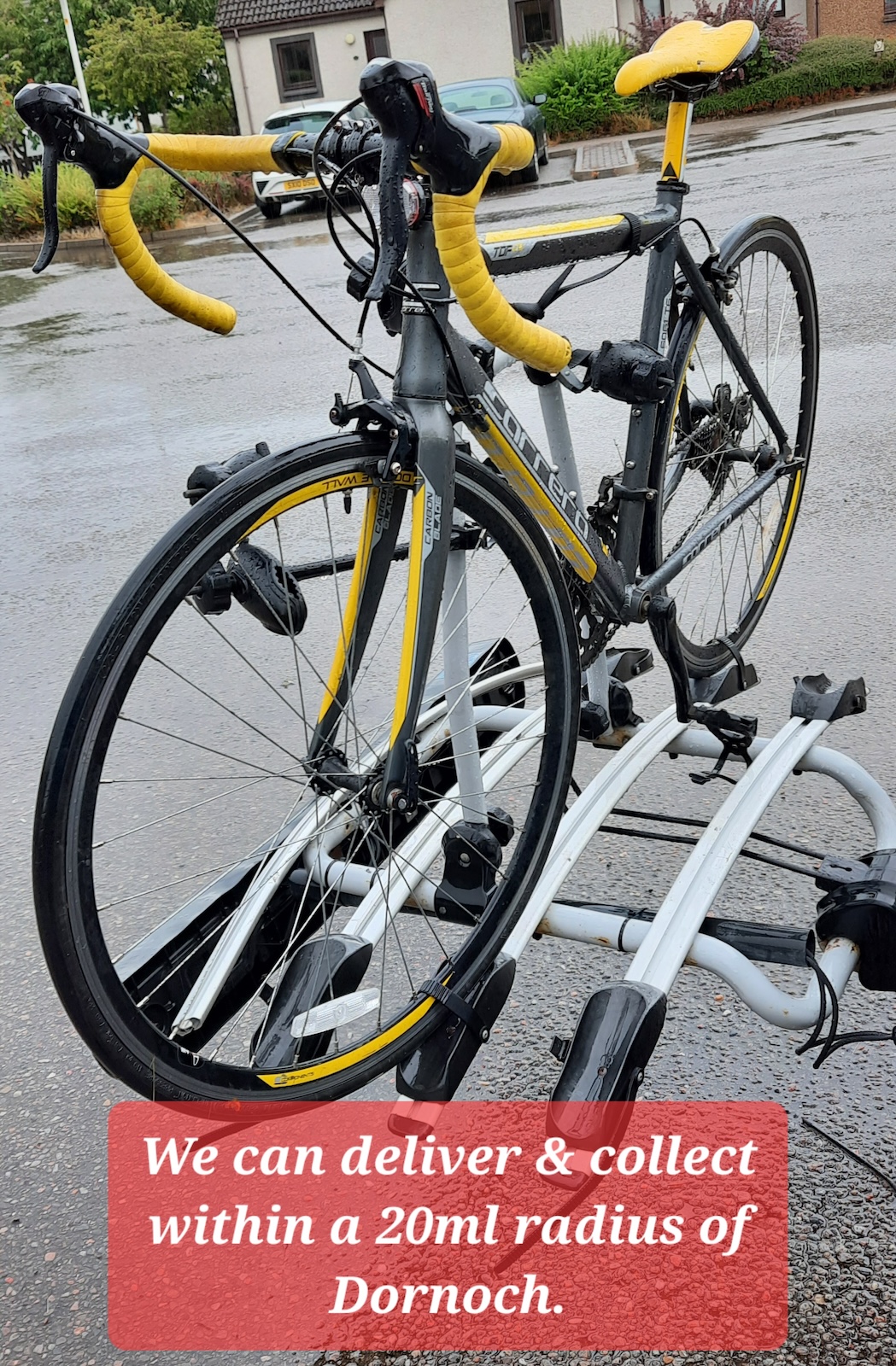 Yellow and black road bike on car bike rack, Dornoch Bike Hire