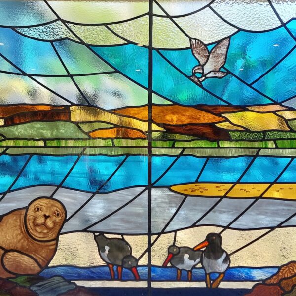 Stained glass window of Loch Fleet in The Meadows, Dornoch