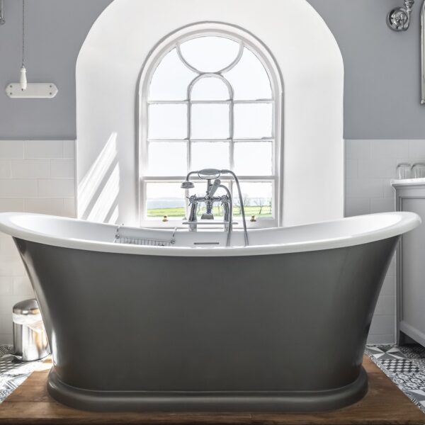 Bathroom in Embo House, Dornoch with grey roll-top bath