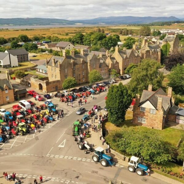 Aerial view of Dornoch Square looking south west with Tractors parked for charity event