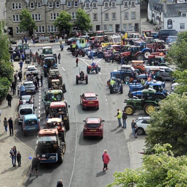 Aerial view of tractors parked in Dornoch Square during Tractor Run event