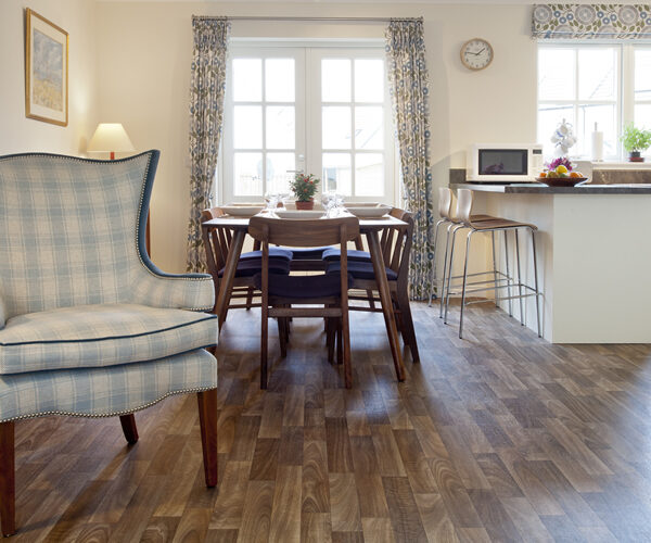 Kitchen diner with wingback chair in 2 Mackay Road Dornoch