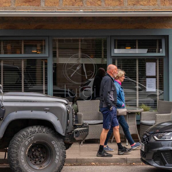 People walking outside Luigi restaurant Dornoch