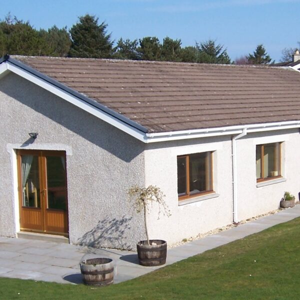 Exterior of Wester Whinhill, Dornoch on sunny day