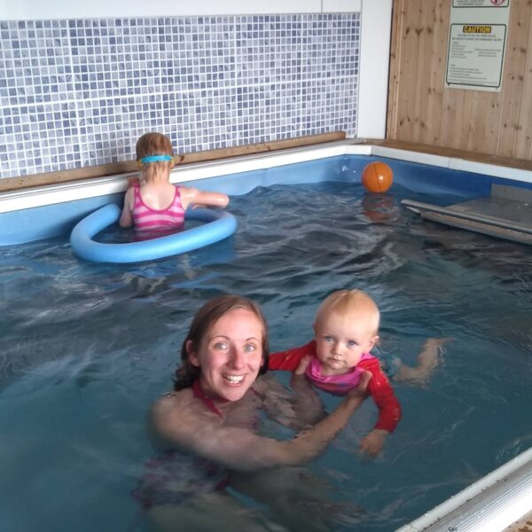 Female and two children in swimming pool, Wester Whinhill Dornoch