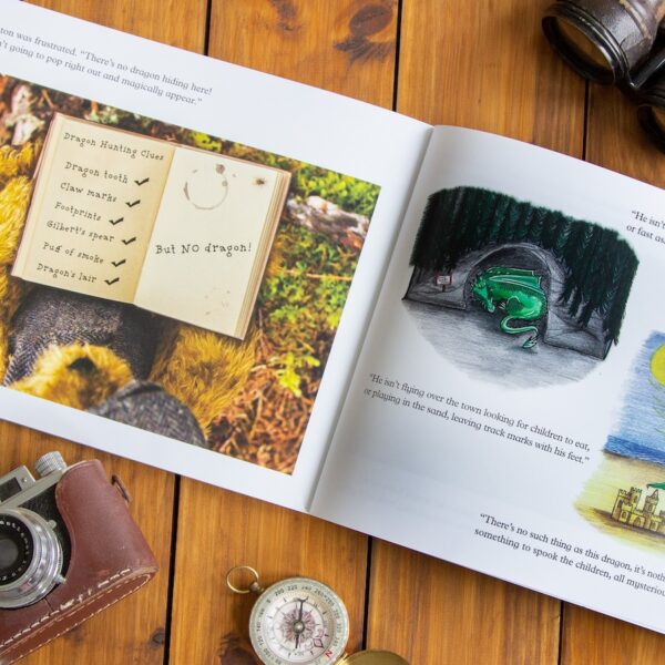 Interior pages of Winton the Bear illustrated children's book with camera, binoculars and compass